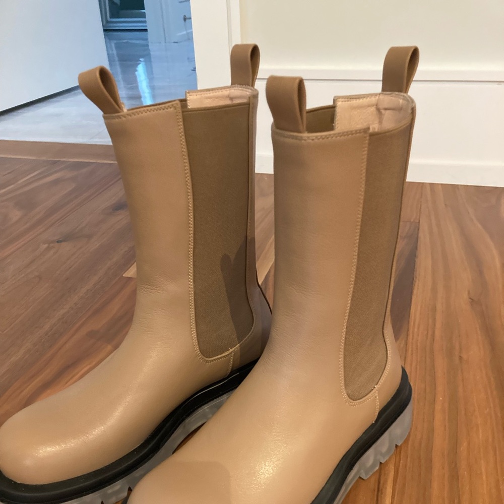 Faux leather boots with rubber soles.